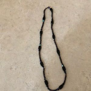 This fun necklace is strung on a stretchy twine